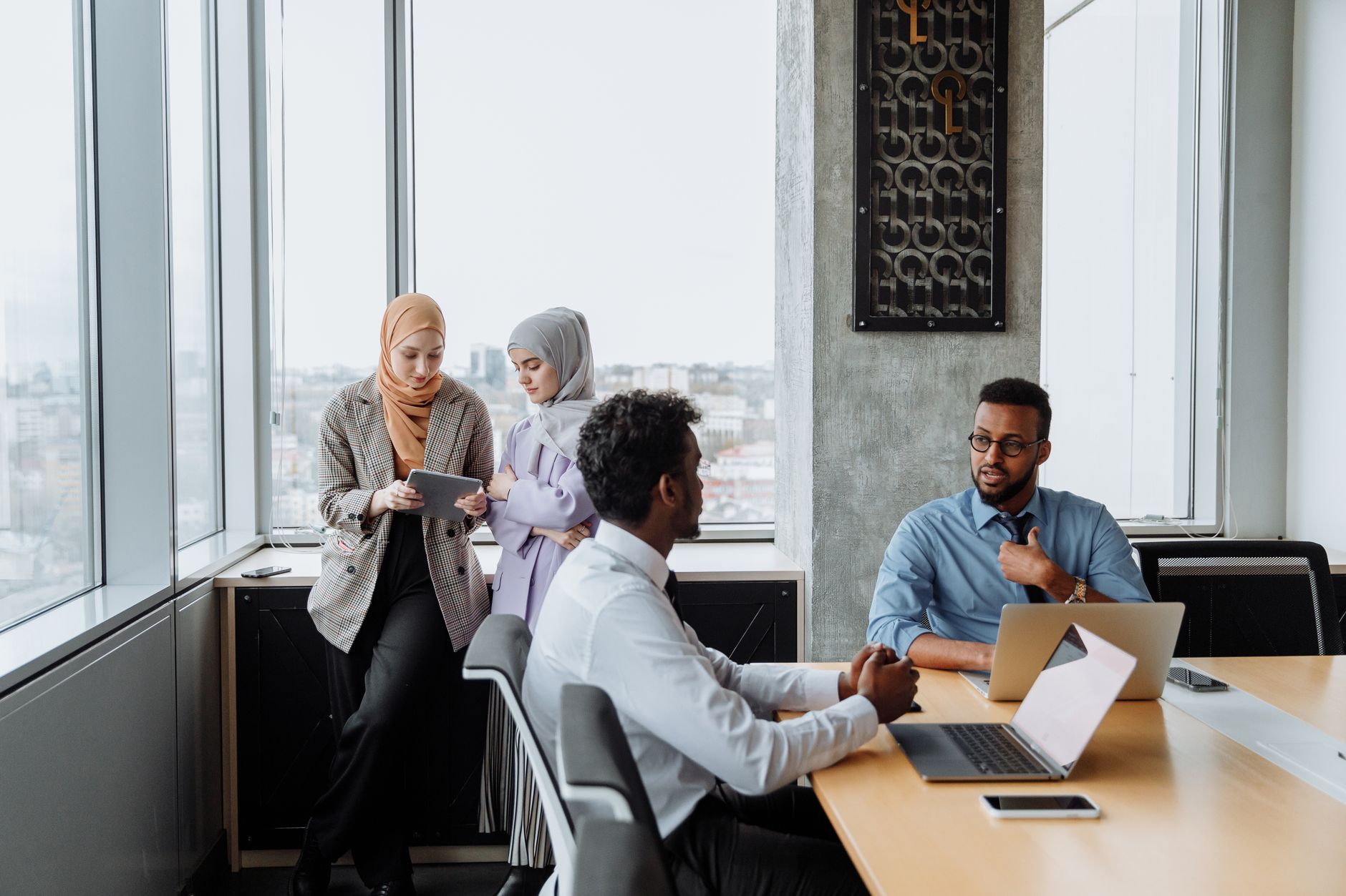 Modern consulting team collaborating in a bright office